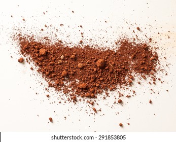 Red Soil Isolated On White Background. Pile Of Dirt And Stones. Top View Of A Heap Of Ground. Close Up Macro View 