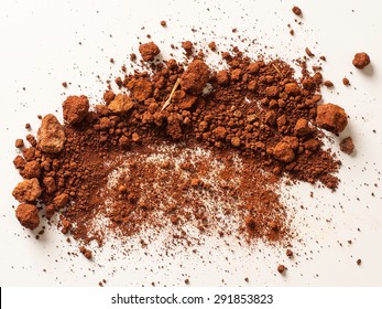 Red Soil Isolated On White Background. Pile Of Dirt And Stones. Top View Of A Heap Of Ground. Close Up Macro View 