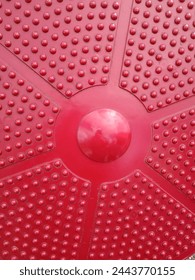 Red solid background with red raised dots solid background