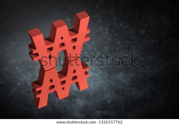Red South Korean Currency Symbol or\
Sign Won With Mirror Reflection on Dark Dusty\
Background