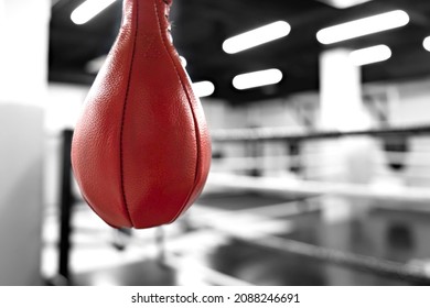 Red speed punching bag in boxing gym. - Powered by Shutterstock