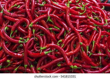 red spicy peppers background