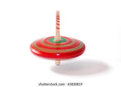 Red Spinning Top Toy On White Background, Old Style Game