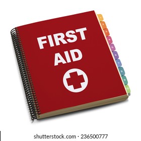 Red Spiral Bound First Aid Handbook Isolated On White Background.