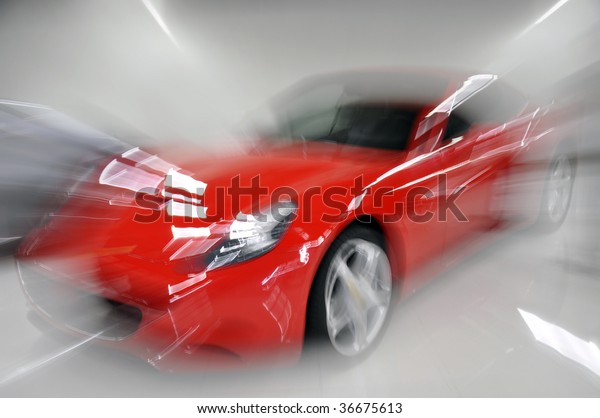 red sport car\
with dynamic zoom blur\
effect