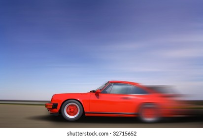 Red Sports Car In Fast Motion