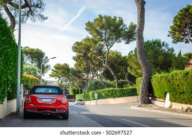 Red Sports Car On The Streets Of The French Riviera