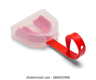 Red Sports Mouth Guard In Case Isolated On White.