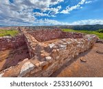 The red stacked stone pueblo foundations of the Tuzigoot National Monument, Clarkdale, Arizona