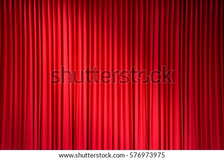 red stage curtain with light spots