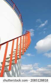 Red Staircase On Fuel Storage Tank