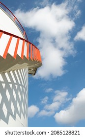 Red Staircase On Fuel Storage Tank