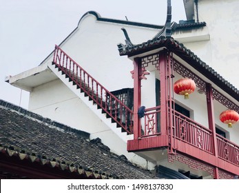 Red Stairs and Lanterns in Traditional Chinese Village