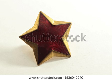 Red star on a white background, communist symbols, red enamel