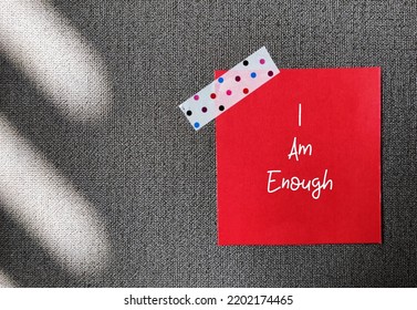 Red Stick Note On Copy Space Wallpaper Background With Handwritten Text I Am Enough - Positive Self Talk Affirmation Mantra To Boost Self Belief And Self Esteem