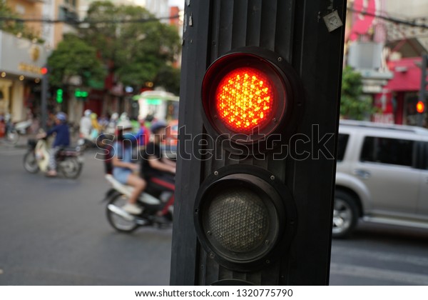 Red Stop Light On The Street In The Ho Chi Minh
City, Vietnam.