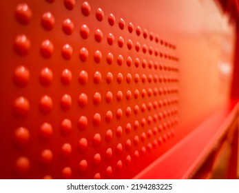 red storage boxes in the warehouse. close-ups
