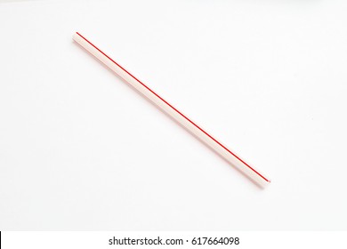 red straw for drinking on white background