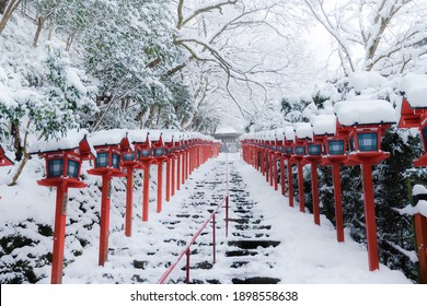 Red streets and stairs covered with snow