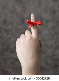 Red String Around The Finger As A Reminder