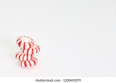 Red Striped Christmas Starlight Peppermint Mints On A White Background