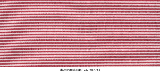 Red striped tablecloth background texture. Fabric wallpaper. Horizontal banner