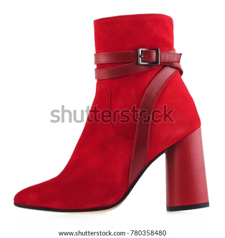 Red suede female boots on heel isolated on white background