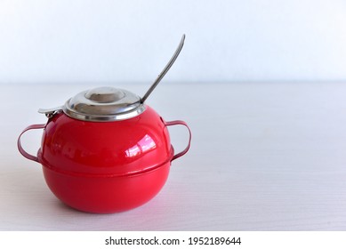 Red Sugar Bowl On White Background.