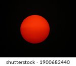 red sun in the dark background