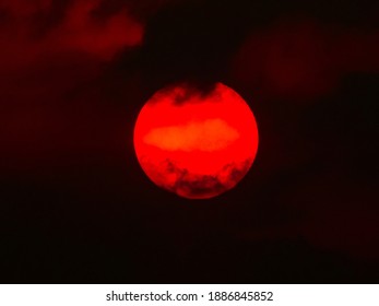 red sun in the dark sky