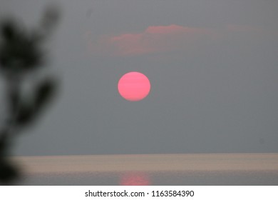 Red Sun Setting Over Lake Michigan As Seen From The Headlands International Dark Sky Park