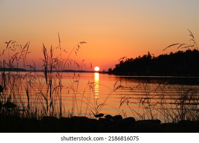 Red sunset in the archipelago ocean Sweden