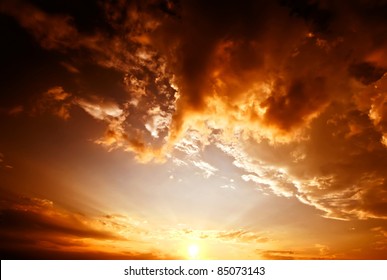 Red Sunset, Rich Dark Clouds, Rays Of Light