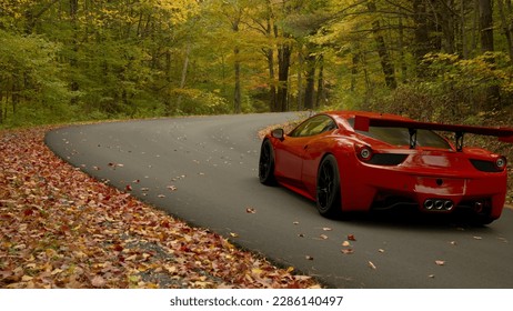 Red supercar hurtles on the roads of an autumn forest