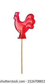 Red sweet cock, cockerel, lollipop on a stick, isolated on white background with clipping path. Caramel lollipop 