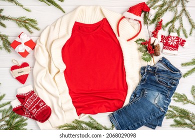 Red T Shirt Mockup With Copy Space And Christmas Holiday Flatlay. Top View Blank T-shirt On White Background. Happy New Year Decorations