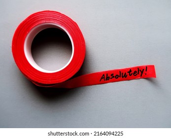 Red tape on gray background with handwritten text ABSOLUTELY! means to agree completely - beyond any doubt ,  totally certain or very clear explanation or without exception - Shutterstock ID 2164094225