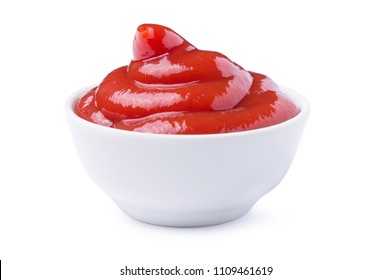 Red tasty ketchup or tomato sauce in bowl isolated on white background