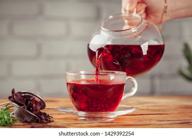 Red Tea On A Wooden Table