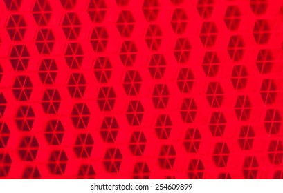 Red technical background with hexagon patern.