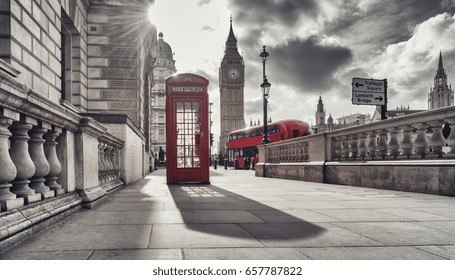 Red telephone booth and Big Ben in London, England, the UK. The symbols of London in black on white colors.