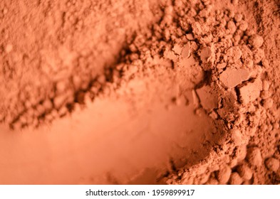 Red Terracotta Bentonite Clay Powder. Natural Beauty Treatment And Spa. Clay Texture Macro, Selective Focus. Abstract Background.