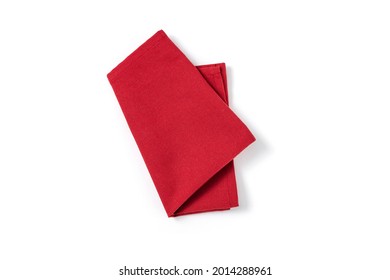 Red Textile Napkin Isolated On White Background. Folded Decorative Kitchen Cotton Towel. Top View