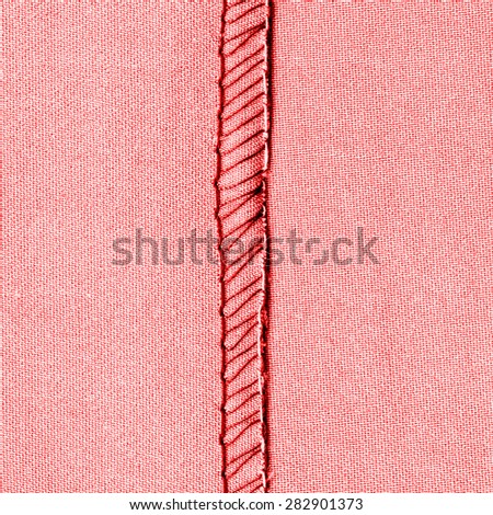 red textile texture with  inseam