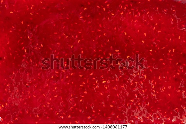  Red texture of raspberry\
jam.