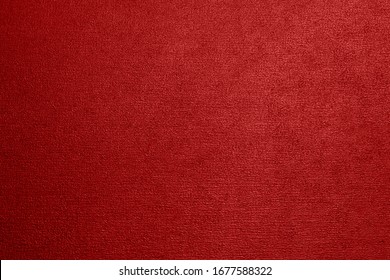Red textured background with a gradient.