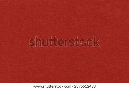 Red textured background with a gradient. Close-up long and wide texture of natural red fabric or cloth in light red color. Fabric texture of natural cotton or linen textile material. Red canvas