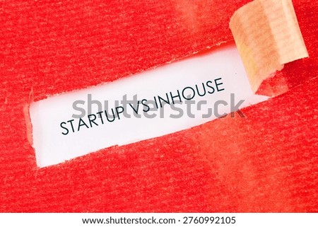 Red textured paper dramatically tears away, unveiling a stark choice between forging a path with a startup or joining an inhouse team.