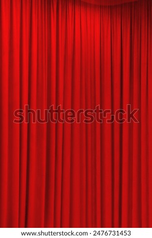 red theater curtain that dropped down as a straight line. Background for inserting text, empty spaces.	
