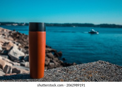 Red Thermos Red Background Sea